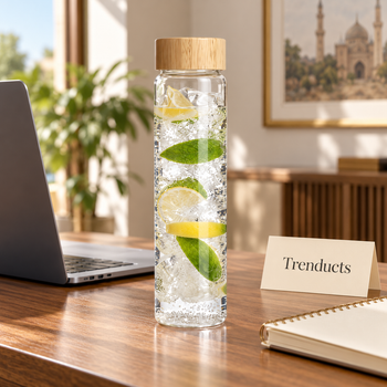1 litre glass drinks bottle with infused water on an office desk - Trenducts