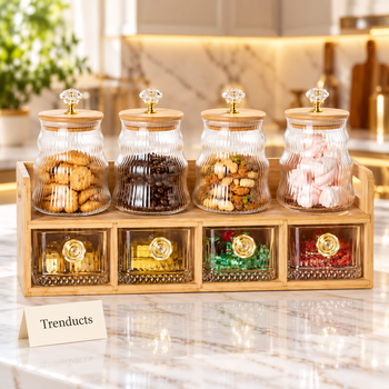 Glass jars with wooden rack holding snacks on a kitchen counter | Trenducts