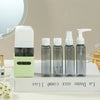 4-in-1 Rotating Travel Bottle Set – 60ml Refillable Leak-Proof Toiletry Kit