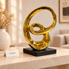 Gold Abstract Spiral Sculpture with Black Base