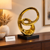 Gold Abstract Spiral Sculpture with Black Base
