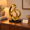 Gold Swan Loop Sculpture with Black Base