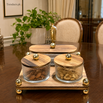 Three covered dry fruit containers in an elegant dining room