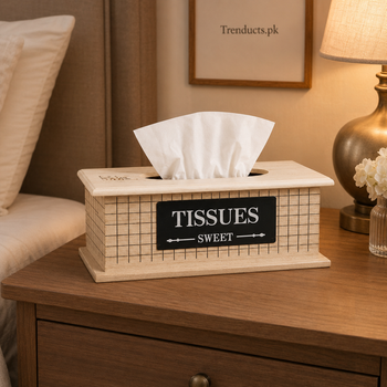 Wooden grid-pattern tissue box on a warm bedside table